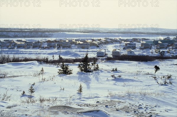 CANADA, Quebec, ?, The Great Whale settlement. Cree indigenous housing amongst heavy snow cover in January.