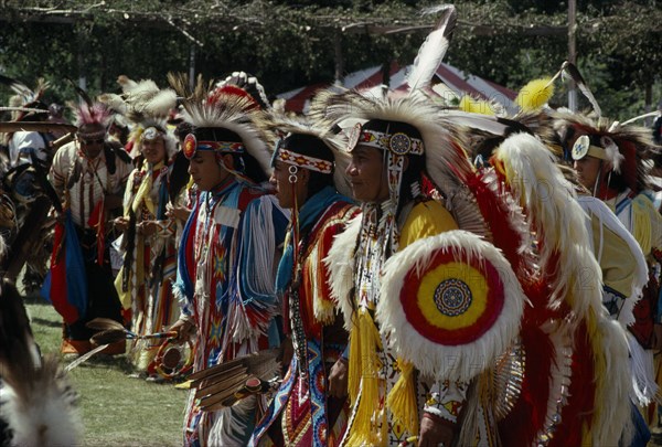 CANADA, Alberta, Edmonton, Blackfoot Native American Indians and other plains Indians wearing full regalia at Pow Wow outside Edmonton