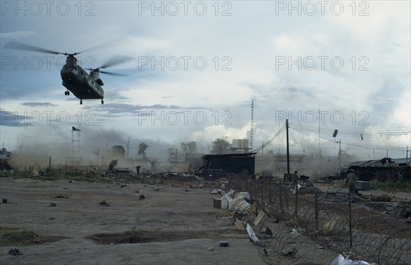 VIETNAM, Central Highlands, Kontum, "Helicopter takes off at dusk from Kontum, under siege by the North Vietnamese in tribal Montagnard region of Central Highlands2009243320092433 "