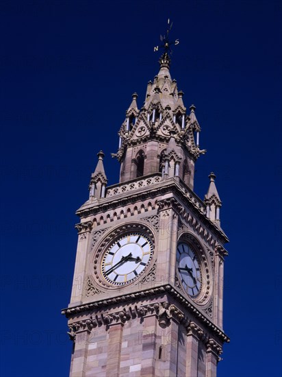 IRELAND, North, Belfast, "The Albert Memorial Clock Tower in Queen’s Square, constructed 1865-1870 as a memorial to Queen Victoria’s consort Prince Albert.  Clock face and spire."