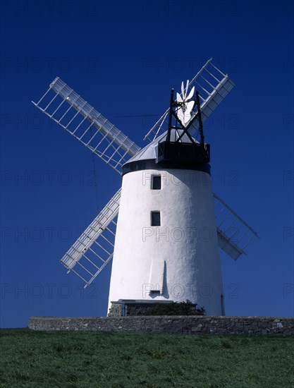 IRELAND, North, County Down, "Ballycopeland Windmill.  White painted windmill standing against blue, cloudless sky."