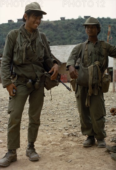 LAOS, Xianghoang, War, "Meo soldiers carrying guns and grenades, members of the CIA army under Gen. Vang Pao wait at Ban Xon airport to 2009251320092513200925132009251320092513 be flown out to the battle front"