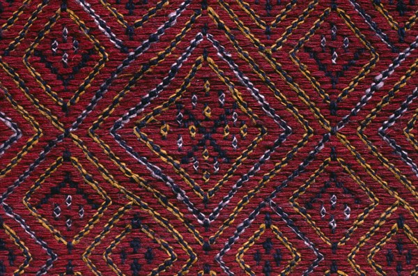 BANGLADESH, Crafts, Textiles, Detail of red and blue embroidered murang pinon or loin cloth.