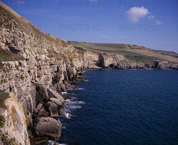 ENGLAND, Dorset, Jurassic Coastline, View east towards and beyond Seacombe Quarry from Winspit ledges