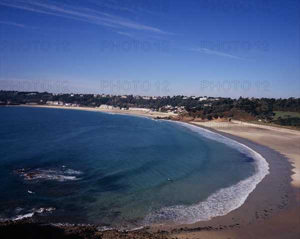 UNITED KINGDOM, Channel Islands, Jersey, Ouaisne Bay with St Brelade’s Bay beyond