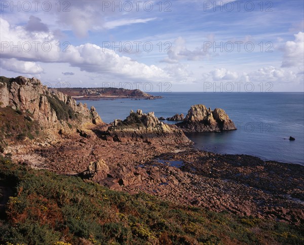 UNITED KINGDOM, Channel Islands, Jersey, "St Brelade. Beau port rocky shore with tide out, view eastwards"