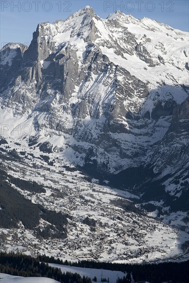 SWITZERLAND, Bernese Oberland, Grindelwald, The town of Grindelwald spread out under Wetterhorn Mountain.