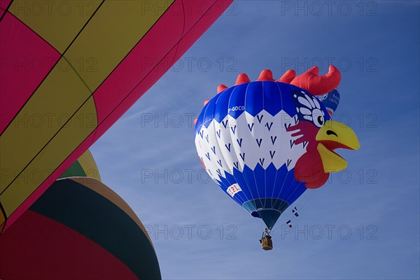 SWITZERLAND, Canton de Vaud, Chateau d'Oex, Single Hot Air Balloon as it ascends after take off.