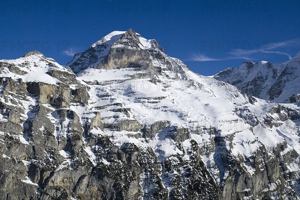 SWITZERLAND, Bernese Oberland, Murren, Summit of the Monch Mountain from outskirts of Murren.