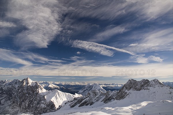 GERMANY, Bavaria, Zugspitze, Vista south from Zugspitzplatt with dramatic sky.