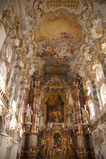 GERMANY, Bavaria, Wieskirche, "Baroque church, interior view of main altar and ornately painted ceiling"