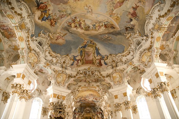 GERMANY, Bavaria, Wieskirche, "Baroque church, interior view of ornamentation and frescoes painted on celling above main altar "