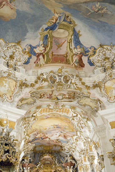 GERMANY, Bavaria, Wieskirche, "Baroque church, interior view of ornamentation and frescoes painted on celling above main altar "