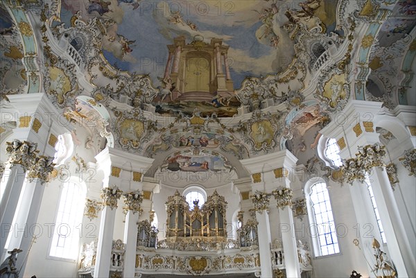GERMANY, Bavaria, Wieskirche, "Baroque church, interior view of the church organ and frescoes on ceiling depicting Door of Heaven / Paradise"