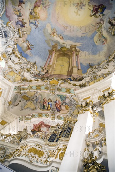 GERMANY, Bavaria, Wieskirche, "Baroque church, interior view of the church organ and frescoes on ceiling depicting Door of Heaven / Paradise"