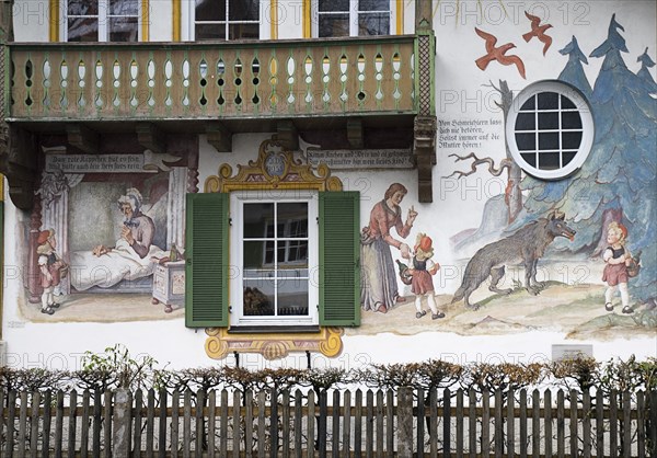 GERMANY, Bavaria, Oberammergau, Rotkappchenhaus or Red Riding Hood House. Close up of fresco detail.
