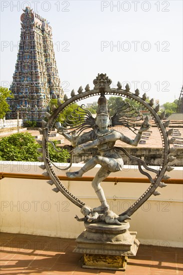 INDIA, Tamil Nadu, Madurai, "Nataraja, dancing posture of Hindu God Shiva and a gopuram, Meenakshi Temple"
