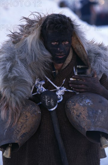 GREECE, North, Volakas, Reveller dressed as an Arapis during New Year carnival in village near Dhrama.