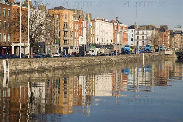 20093554 IRELAND Dublin Dublin Quayside buildings reflected in the River Liffey near Capel Street Bridge