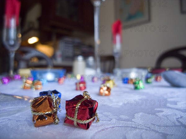 FESTIVALS, Religious, Christmas, Minature wrapped Christmas presents used as festive dinner table decorations.