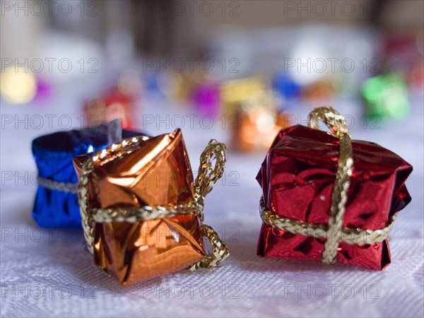 FESTIVALS, Religious, Christmas, Minature wrapped Christmas presents used as festive dinner table decorations.