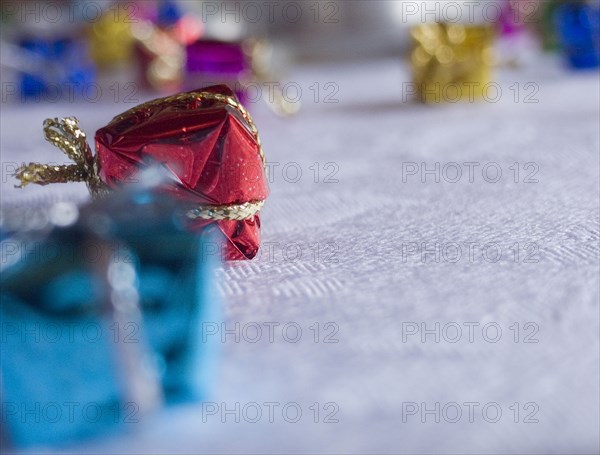 FESTIVALS, Religious, Christmas, Minature wrapped Christmas presents used as festive dinner table decorations.