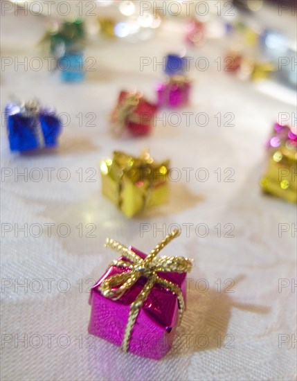 FESTIVALS, Religious, Christmas, Minature wrapped Christmas presents used as festive dinner table decorations.