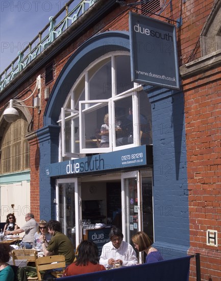 ENGLAND, East Sussex, Brighton, Due South restaurant in the arches underneath the promenade.