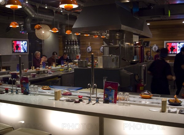 ENGLAND, East Sussex, Brighton, Interior of Yo Sushi bar in Jubilee Street.