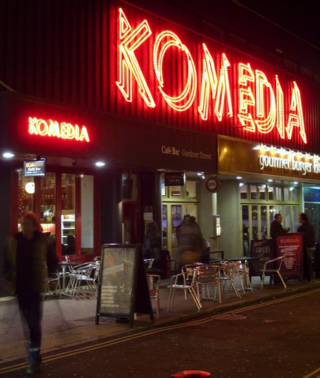 ENGLAND, East Sussex, Brighton, "Exterior of the Komedia theatre, cafe and bar in Gardner Street. Neon Sign"