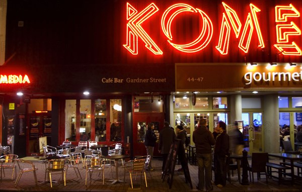 ENGLAND, East Sussex, Brighton, "Exterior of the Komedia theatre, cafe and bar in Gardner Street. Neon Sign"