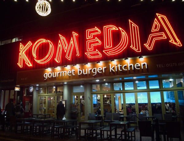 ENGLAND, East Sussex, Brighton, "Exterior of the Komedia theatre, cafe and bar in Gardner Street. Neon Sign"