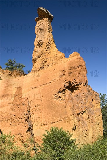 FRANCE, Provence Cote d’Azur, Vaucluse, "Colorado Provencal.  Cheminee de Fee or Fairy Chimneys, eroded column of ochre rock."