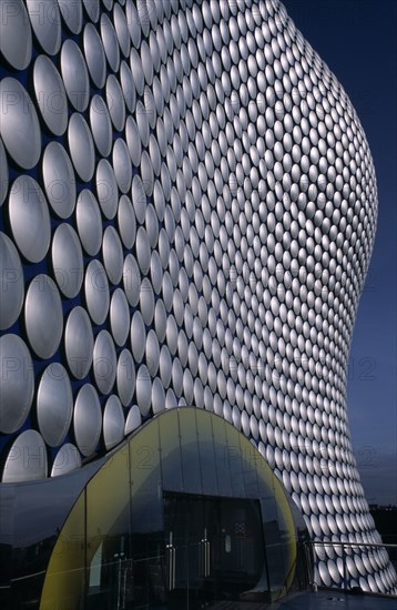 ENGLAND, West Midlands, Birmingham, Selfridges Store at The Bullring Shopping Centre. Exterior detail of the spun aluminium discs and glass entrance.
