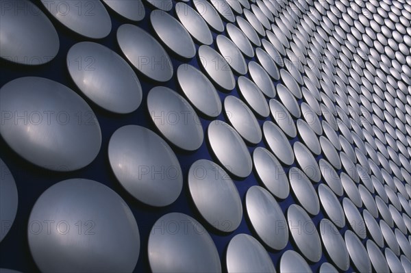 ENGLAND, West Midlands, Birmingham, Selfridges Store at The Bullring Shopping Centre. Exterior detail of the spun aluminium discs.