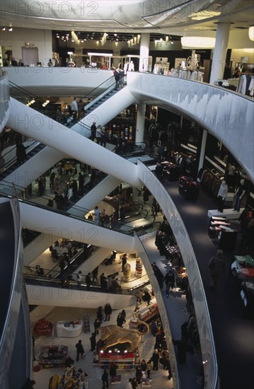 ENGLAND, West Midlands, Birmingham, The Bullring Shopping Centre. Interior view of escalators and department stores on multiple levels