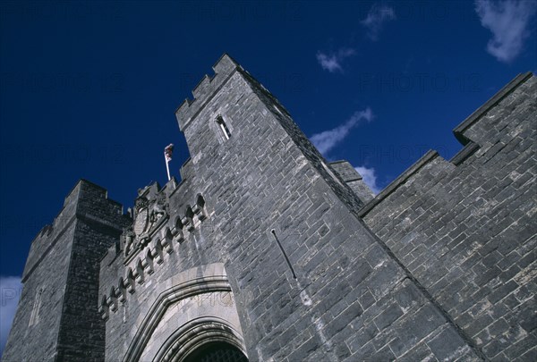 ENGLAND, West Sussex, Arundel, Arundel Castle. Angled part view of the entrance gate and crenelated towers.