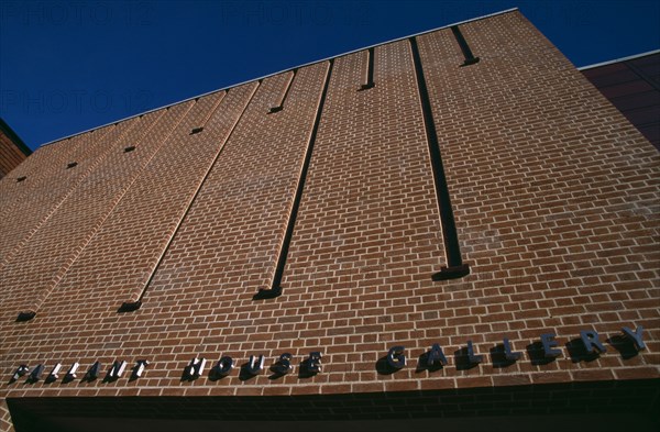 ENGLAND, West Sussex, Chichester, Pallant House Gallery. Angled view of exterior sign above main entrance on the modern extension.