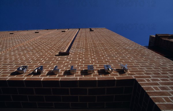 ENGLAND, West Sussex, Chichester, Pallant House Gallery. Angled view looking up at sign above main entrance on the modern extension.