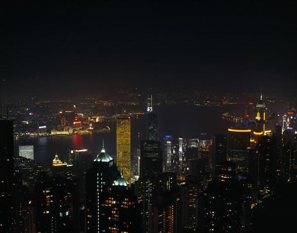 CHINA, Hong Kong, Hong Kong island skyline at night.