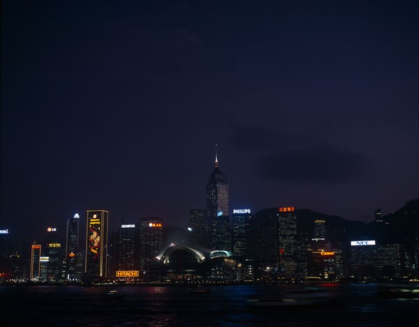 CHINA, Hong Kong, Hong Kong island skyline at night.