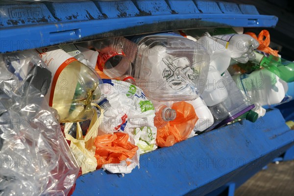 ENVIRONMENT, Green Issues, Recycling, "Plastic cartons, bags and packing in blue bin to be recycled "