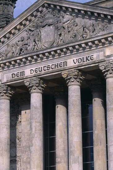 GERMANY, Berlin, Reichstag  seat of the German Parliament.  Part view of exterior facade with inscription in German reading Dem Deutschen Volke - To The German People