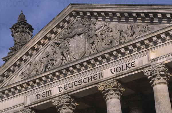 GERMANY, Berlin, Reichstag  seat of the German Parliament.  Part view of exterior facade with inscription in German reading Dem Deutschen Volke - To The German People
