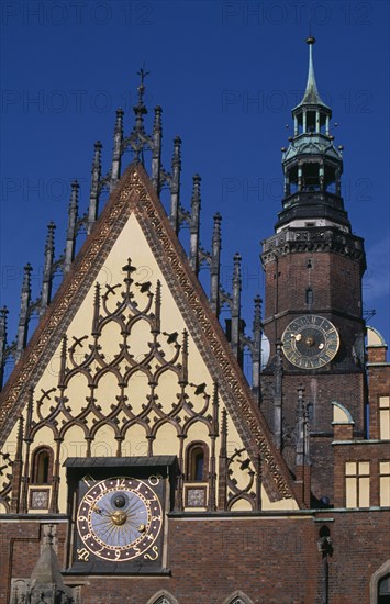 POLAND, Wroclaw, Wroclaw Town Hall dating from the fourteenth century.  Part view of exterior with decorative gable  astronomical clock and clock tower.