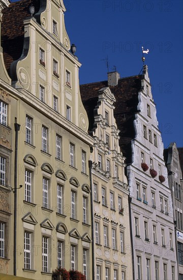 POLAND, Wroclaw, Stare Miasto.  Angled view of pastel coloured building facades in the Old Town Square.