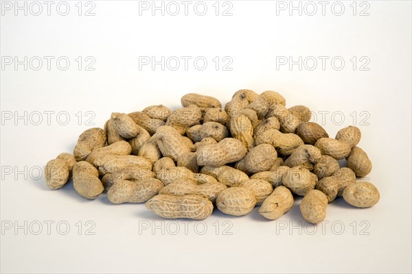 FOOD, Nuts, Groundnuts, Peanuts in kernels on a white background