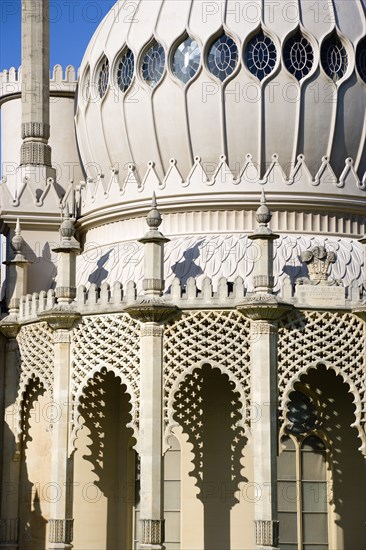 ENGLAND, East Sussex, Brighton, The onion shaped dome of the 19th Century Pavilion designed in the Indo- Saracenic style by John Nash commissioned by George Prince of Wales later to become King George IV. The crest of the Prince of Wales sits above the central arch