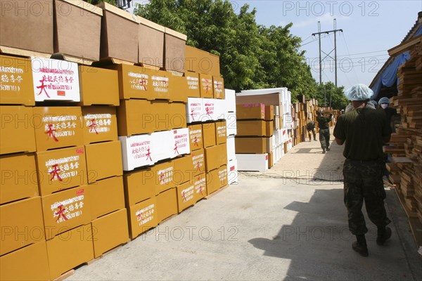 THAILAND, "Phang Nga District,", Takua Pa, "Tsunami. Hundereds of coffins waiting to be used inside the temple Wat Yan Yao temple, the main morgue,where DNA samples are taken from the bodies and wait identifecation, 100kms north of Phuket  on the 2nd Jan."