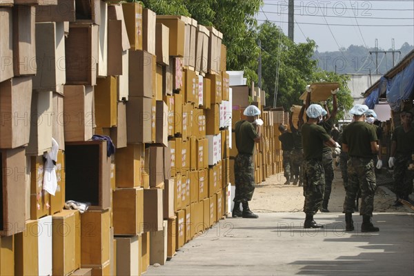 THAILAND, Phang Nga District, Takua Pa, "Tsunami. Hundreds of coffins waiting to be used inside the temple Wat Yan Yao temple, the main morgue,where DNA samples are taken from the bodies and wait identification, 100kms north of Phuket on the 2nd Jan."